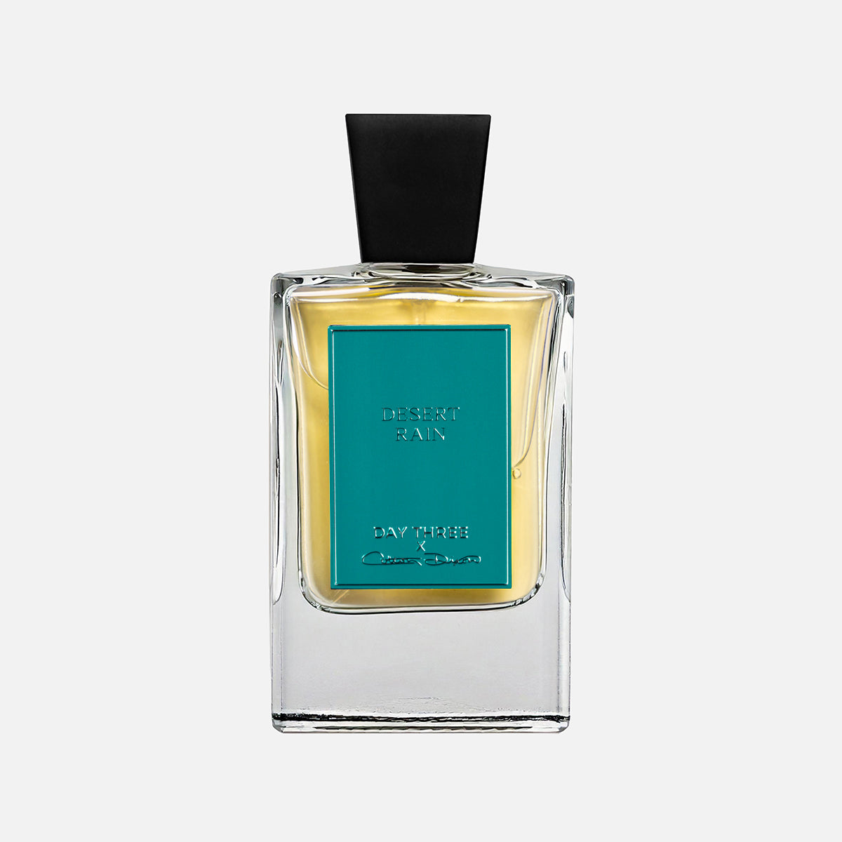 Perfume bottle with teal label on a white background
